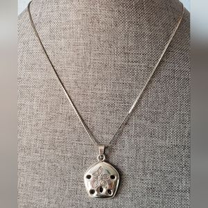 Silvertone sand dollar necklace on 18 inch chain coastal beach style